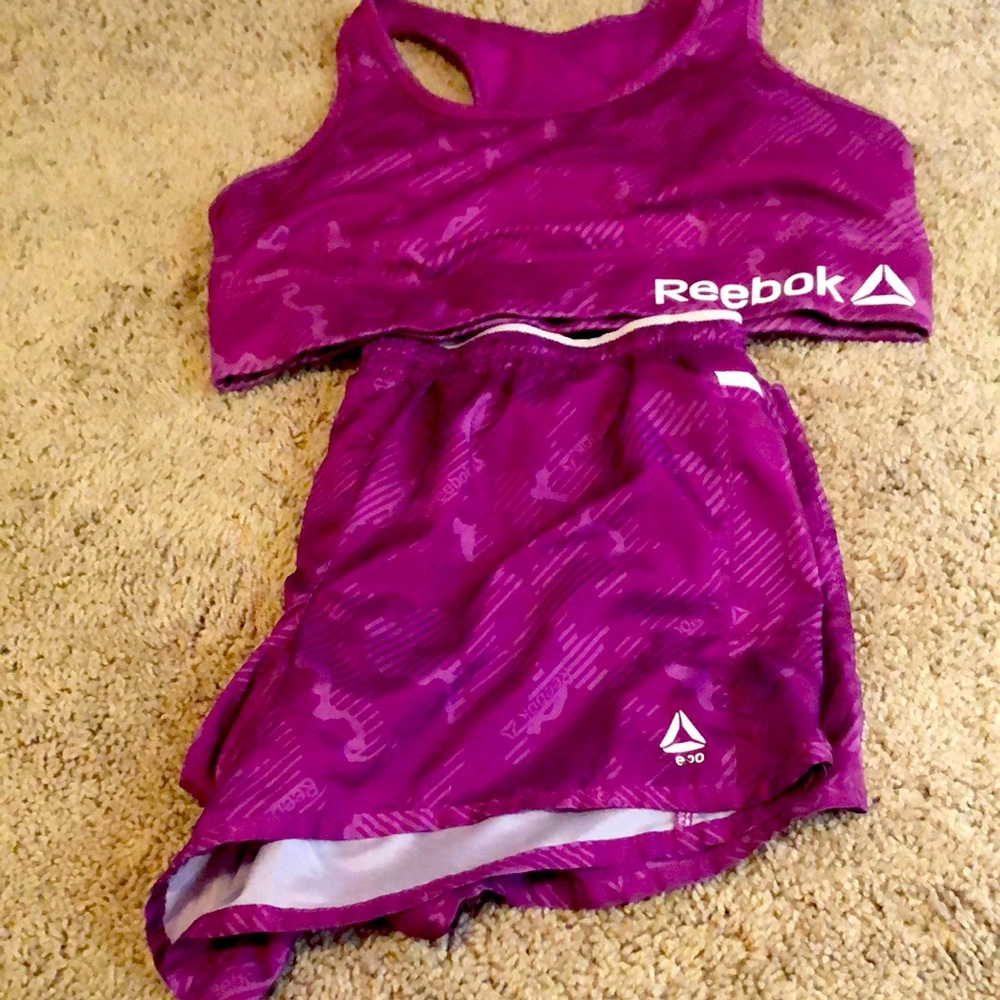 This is a purple Reebok workout outfit in a size XL in women’s